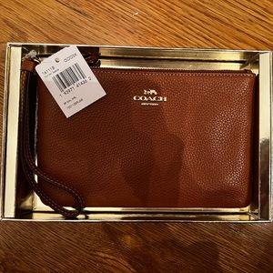 New in box Coach Sadie Wristlet Tan